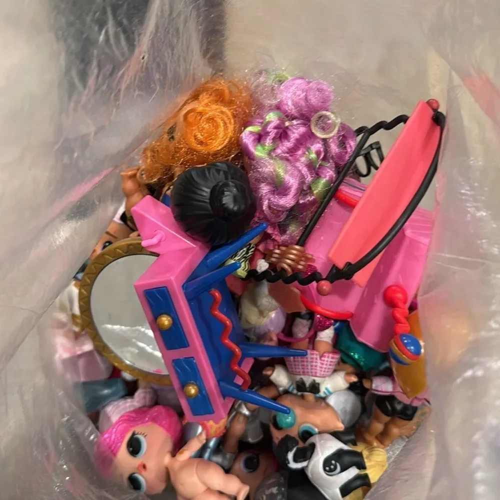 Almost 5lb of Lol dolls , dolls accessories , clothes and some furniture big lot